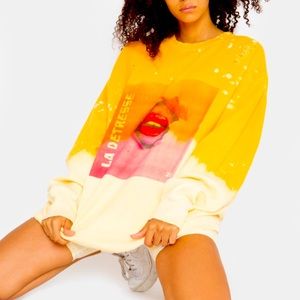 Slip into this unisex one of a kind acid wash hoodie. Vintage inspired .